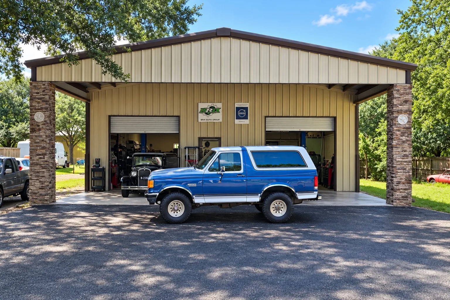 Brix Auto shop on Calvert Rd, Tomball, TX, with a blue Ford Bronco outside