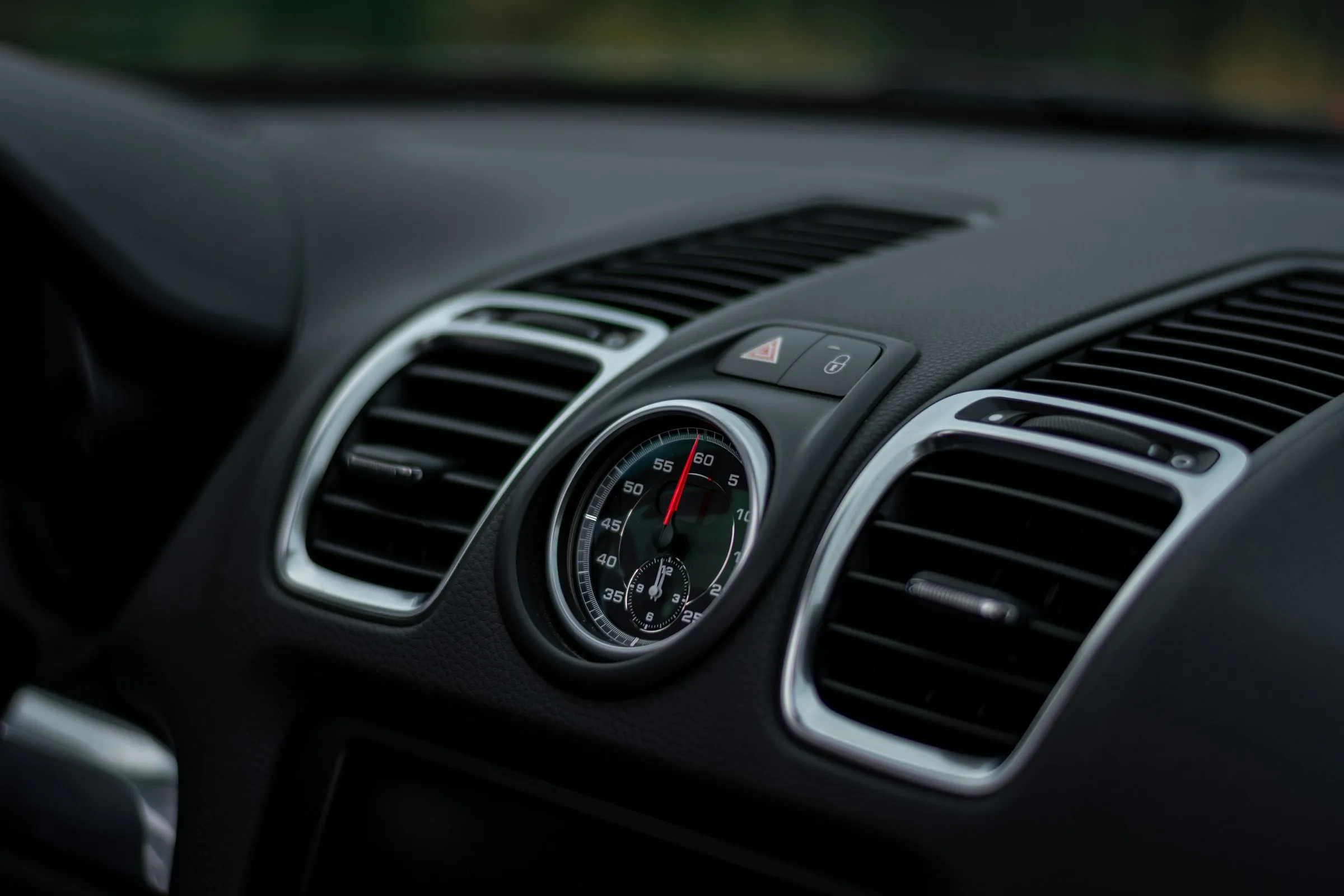 Car AC vent on a dashboard