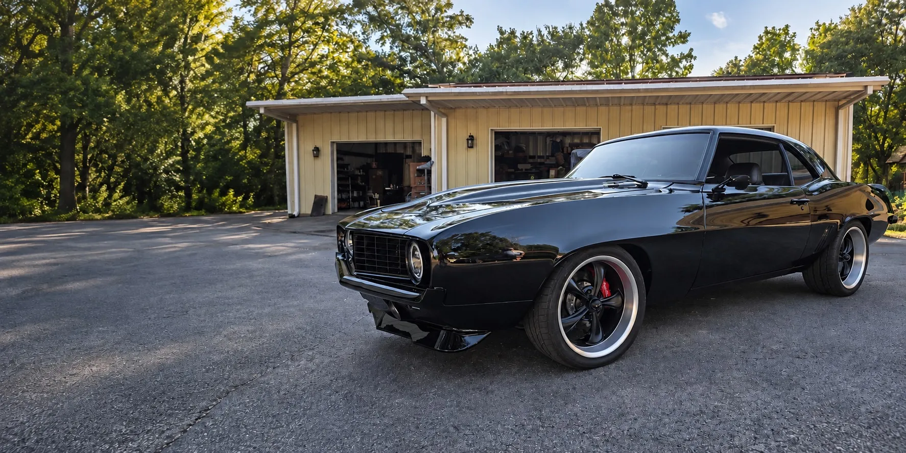 Black Chevrolet Camaro outside Brix Auto, auto repair shop in Tomball, TX