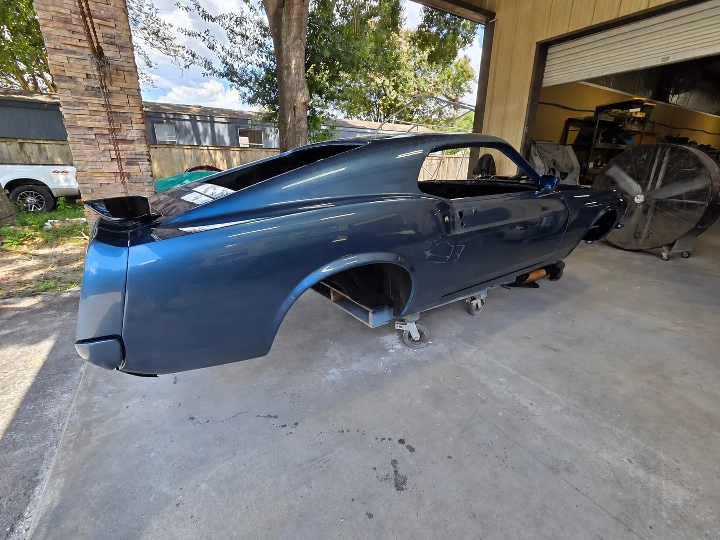 Blue fastback classic car restoration at Brix Auto in Tomball, TX